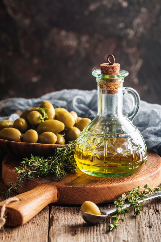Olive oil and bowl of olives