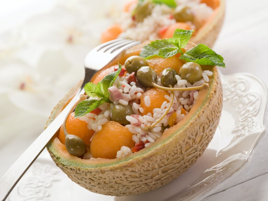rice salad over open melon